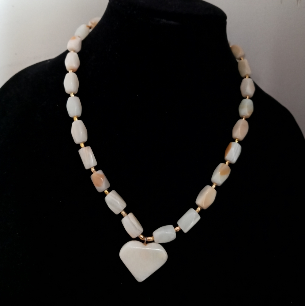 Stone beats heart necklace.